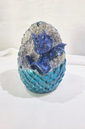 Baby Dragon Sitting in Egg